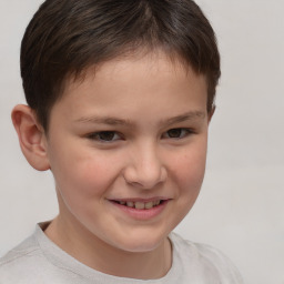 Joyful white child female with short  brown hair and brown eyes