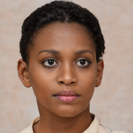 Neutral black young-adult female with short  brown hair and brown eyes