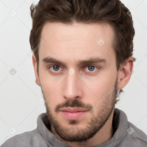 Neutral white young-adult male with short  brown hair and grey eyes