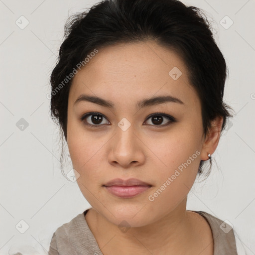 Neutral asian young-adult female with medium  brown hair and brown eyes