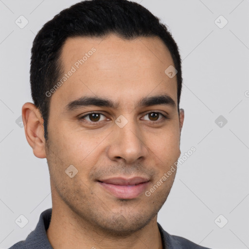 Joyful latino young-adult male with short  black hair and brown eyes