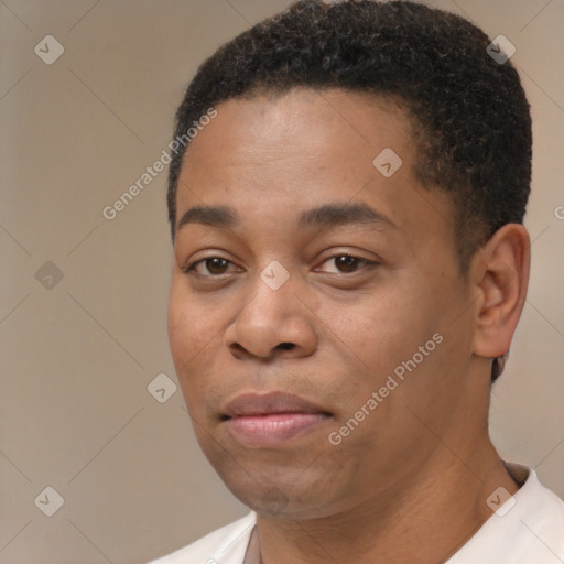 Joyful black young-adult male with short  brown hair and brown eyes