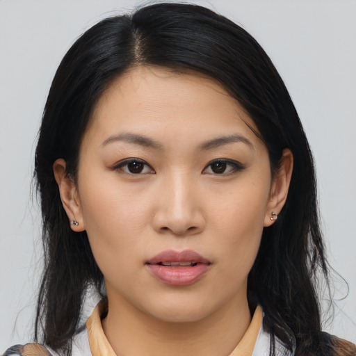 Neutral asian young-adult female with medium  black hair and brown eyes