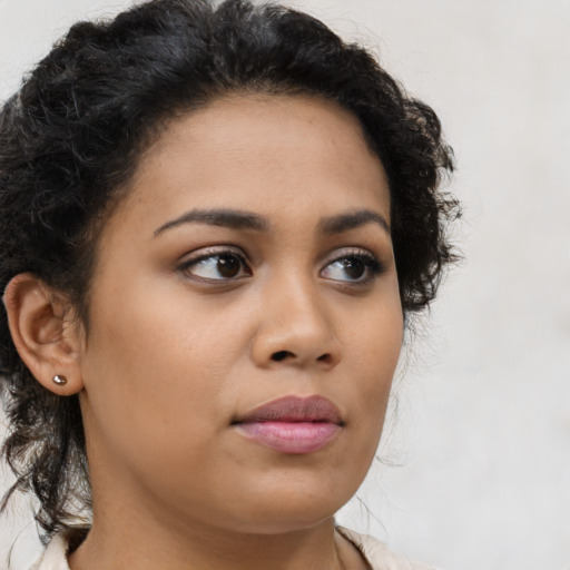 Neutral latino young-adult female with long  brown hair and brown eyes