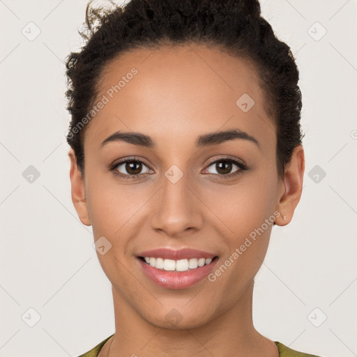 Joyful white young-adult female with short  brown hair and brown eyes