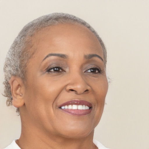 Joyful white adult female with short  brown hair and brown eyes