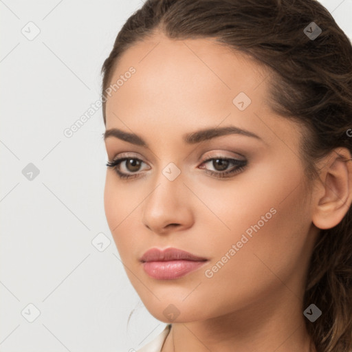 Neutral white young-adult female with long  brown hair and brown eyes