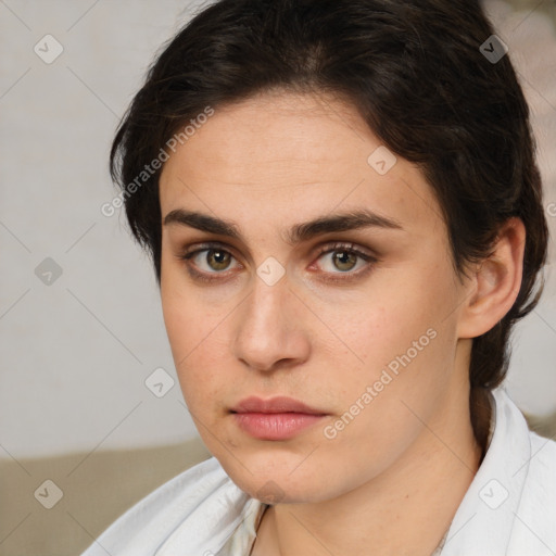 Neutral white young-adult female with short  brown hair and brown eyes