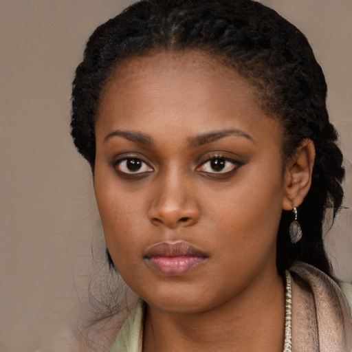 Neutral black young-adult female with long  black hair and brown eyes