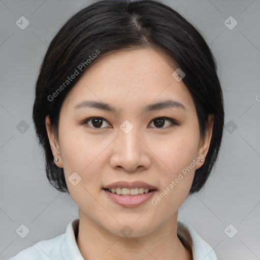 Joyful asian young-adult female with medium  brown hair and brown eyes