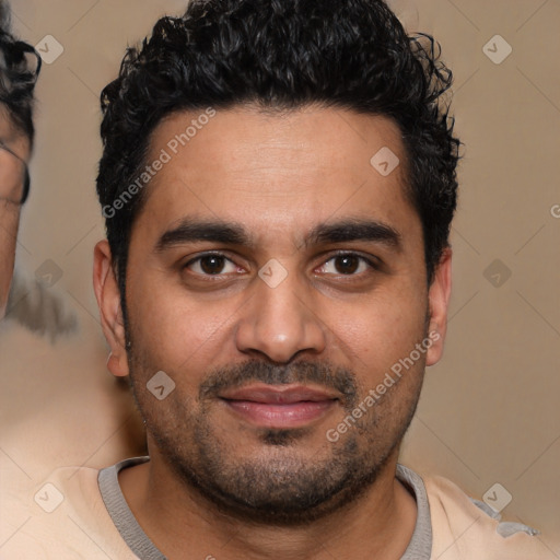 Joyful latino young-adult male with short  black hair and brown eyes