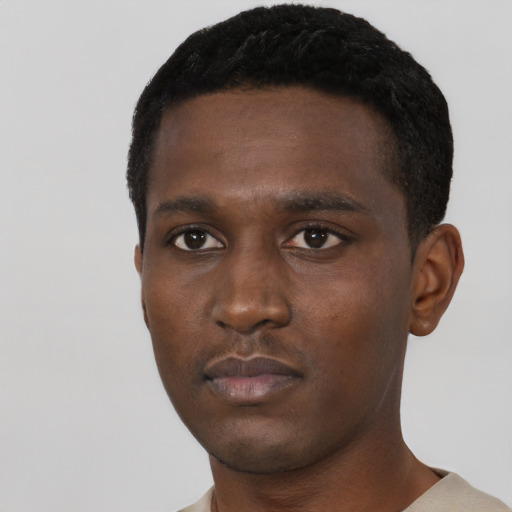 Neutral black young-adult male with short  black hair and brown eyes