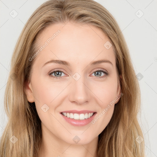 Joyful white young-adult female with long  brown hair and blue eyes