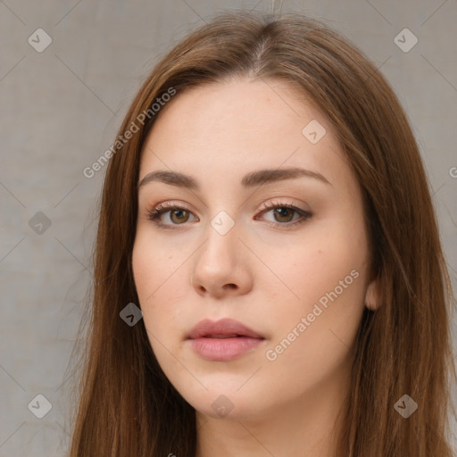 Neutral white young-adult female with long  brown hair and brown eyes