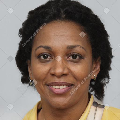 Joyful latino adult female with short  brown hair and brown eyes