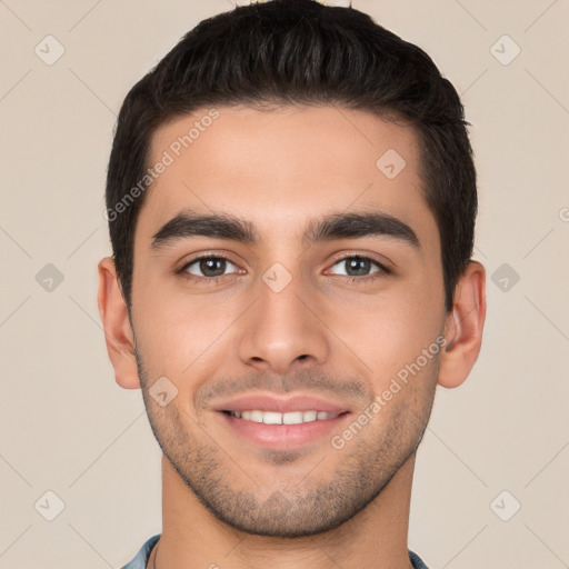 Joyful white young-adult male with short  brown hair and brown eyes