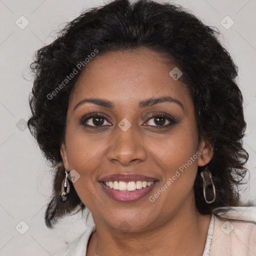 Joyful black young-adult female with medium  brown hair and brown eyes