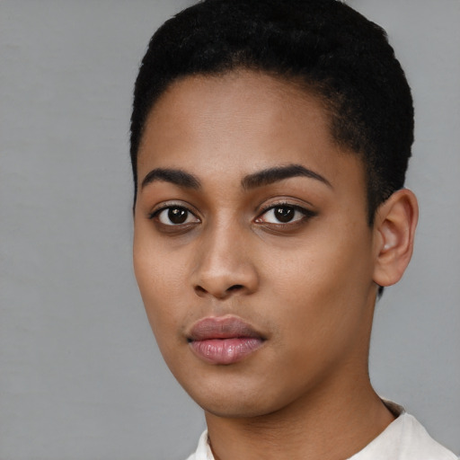 Neutral black young-adult female with short  black hair and brown eyes