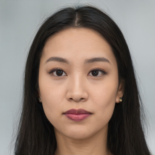 Neutral asian young-adult female with long  brown hair and brown eyes