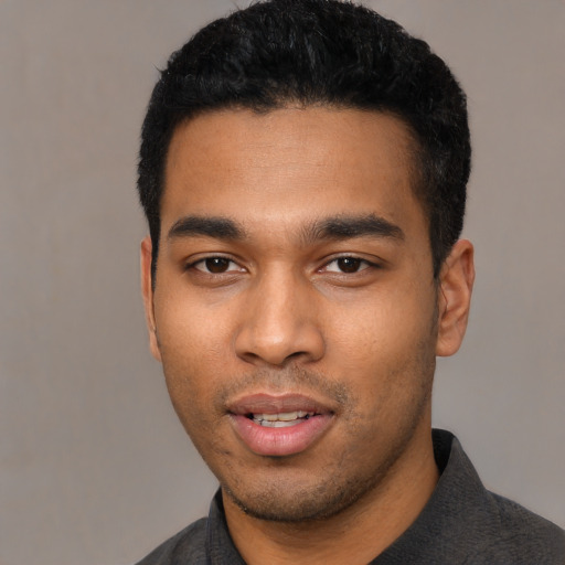 Neutral latino young-adult male with short  black hair and brown eyes