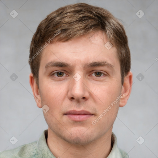 Neutral white young-adult male with short  brown hair and grey eyes