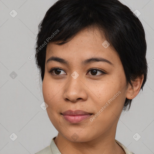 Joyful asian young-adult female with medium  black hair and brown eyes