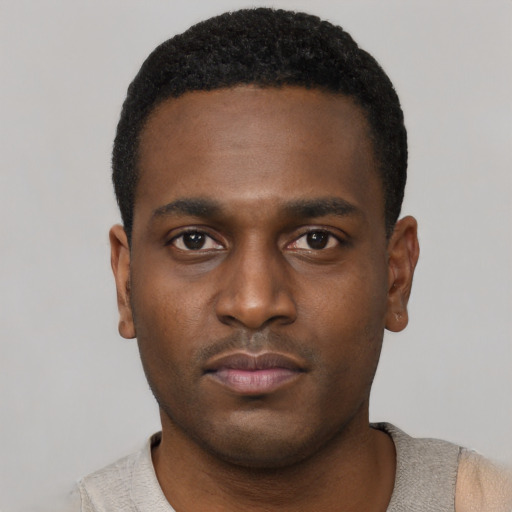 Neutral black young-adult male with short  black hair and brown eyes