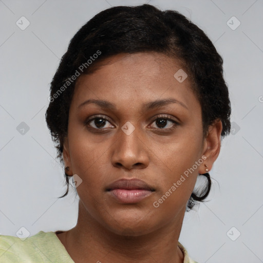Neutral black young-adult female with short  brown hair and brown eyes