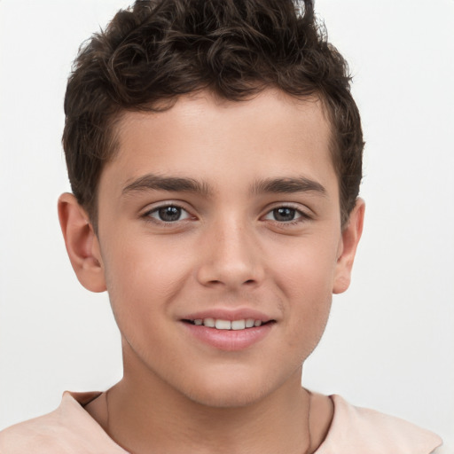 Joyful white child male with short  brown hair and brown eyes