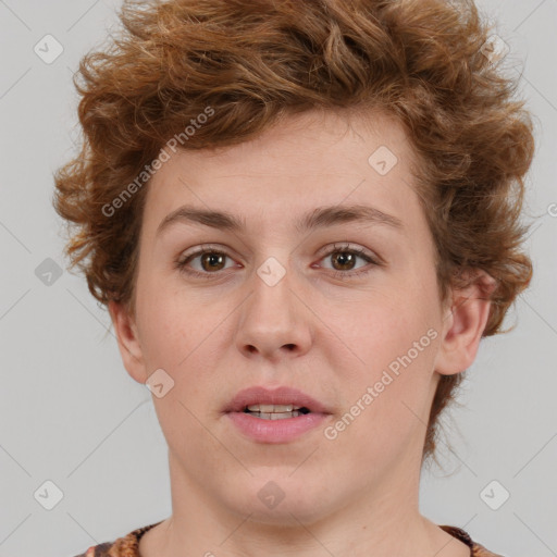 Joyful white young-adult female with short  brown hair and blue eyes