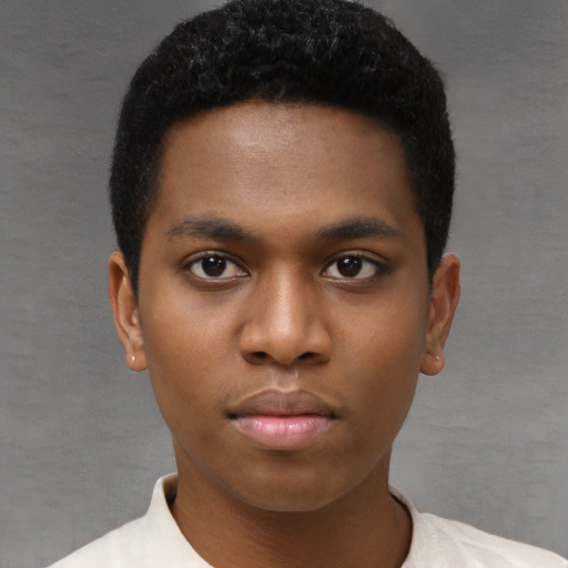 Neutral black young-adult male with short  black hair and brown eyes
