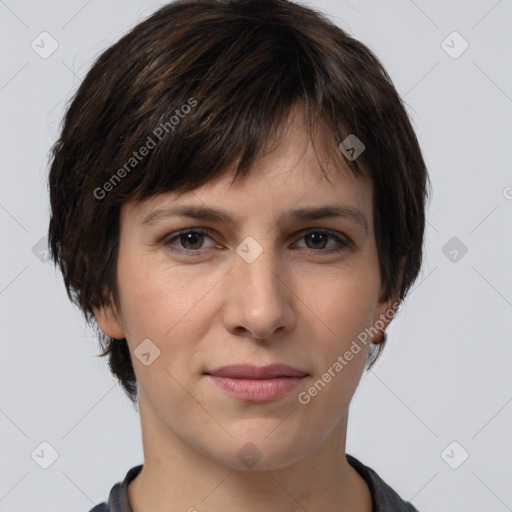 Joyful white young-adult female with short  brown hair and brown eyes