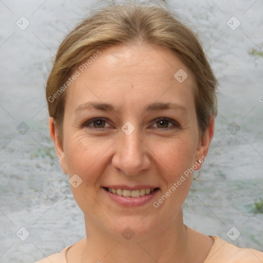 Joyful white adult female with short  brown hair and brown eyes