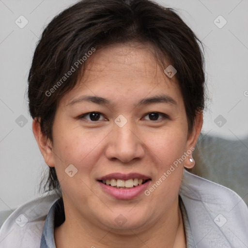 Joyful white adult female with medium  brown hair and brown eyes