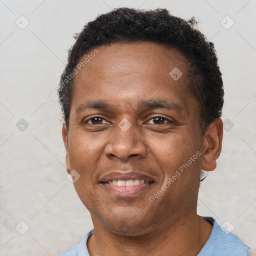 Neutral latino adult male with short  brown hair and brown eyes