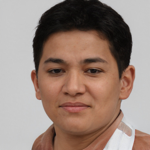 Joyful asian young-adult male with short  brown hair and brown eyes