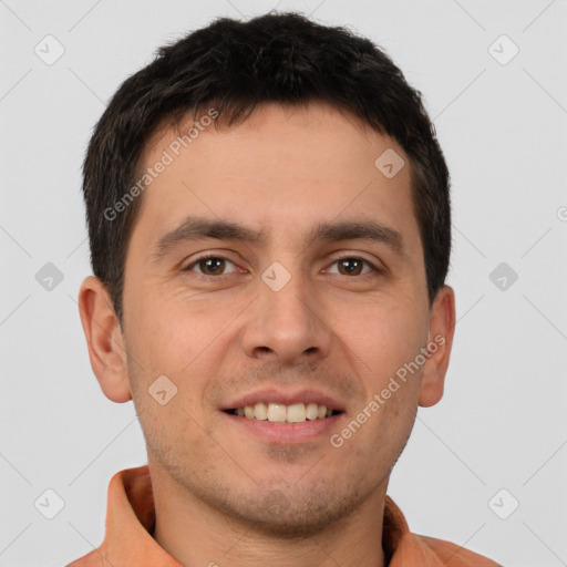 Joyful white young-adult male with short  brown hair and brown eyes