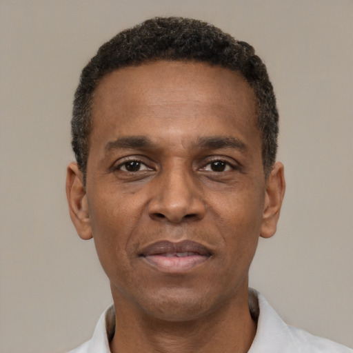 Neutral latino adult male with short  black hair and brown eyes