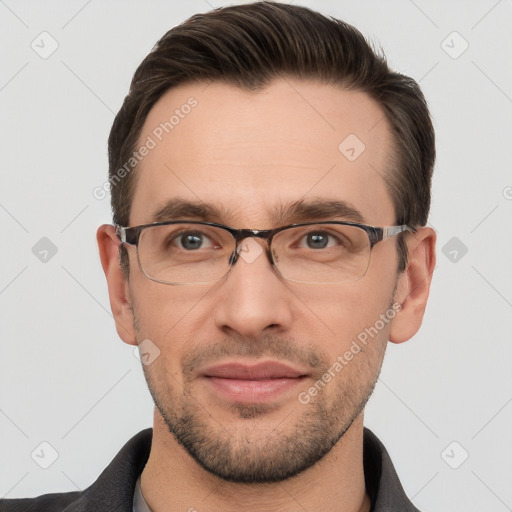 Joyful white adult male with short  brown hair and brown eyes