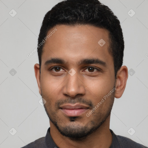 Neutral latino young-adult male with short  black hair and brown eyes