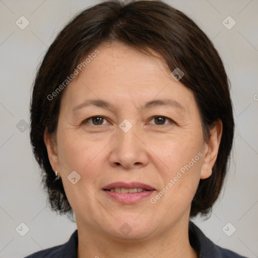 Joyful white adult female with medium  brown hair and brown eyes