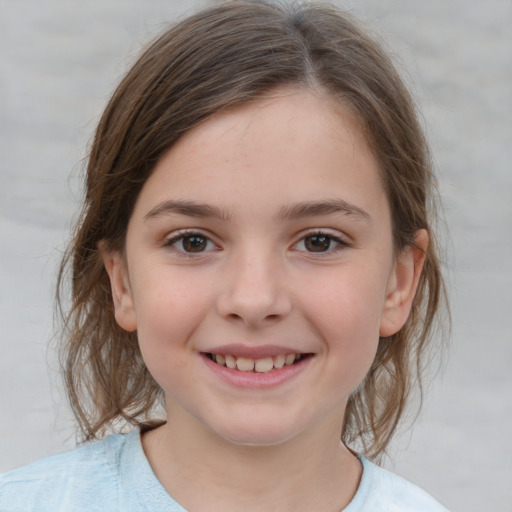 Joyful white child female with medium  brown hair and brown eyes