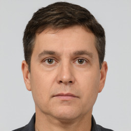Neutral white adult male with short  brown hair and brown eyes