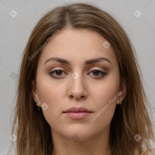 Neutral white young-adult female with long  brown hair and brown eyes