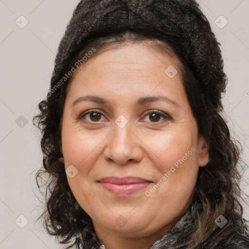 Joyful white adult female with long  brown hair and brown eyes