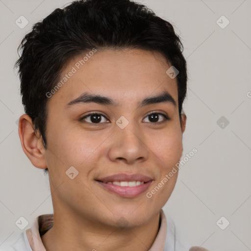 Joyful latino young-adult male with short  brown hair and brown eyes