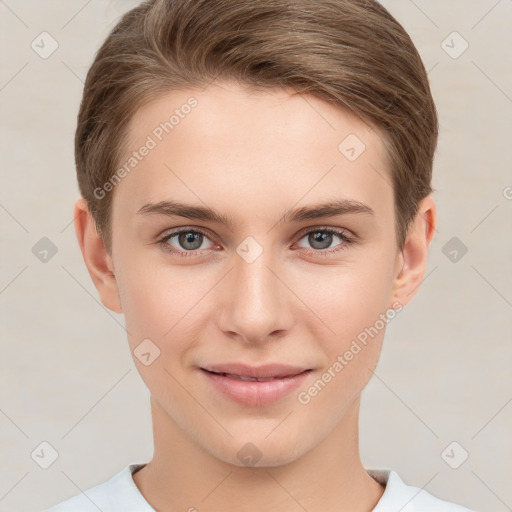 Joyful white young-adult female with short  brown hair and grey eyes