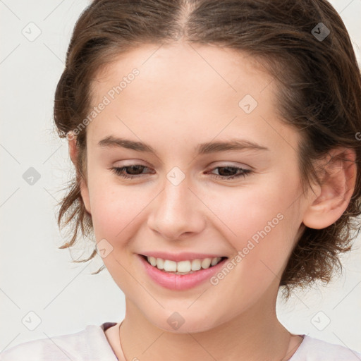 Joyful white child female with medium  brown hair and brown eyes