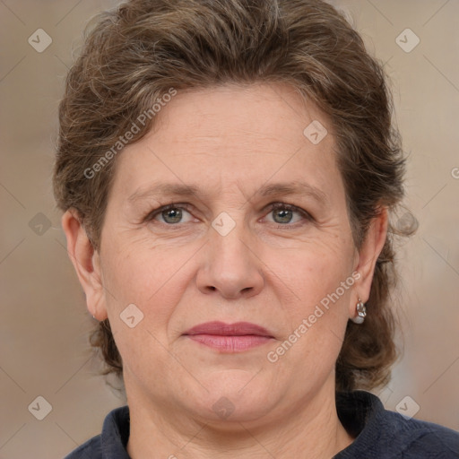 Joyful white adult female with medium  brown hair and grey eyes