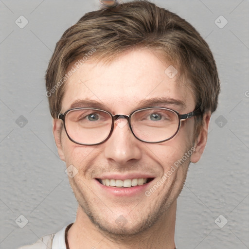 Joyful white adult male with short  brown hair and grey eyes